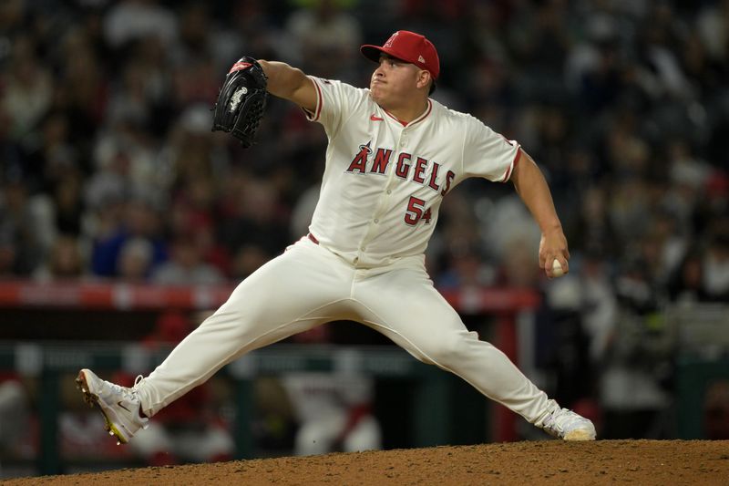 May 30, 2024; Anaheim, California, USA;  Los Angeles Angels relief pitcher Jose Suarez (54) delivers a pitch in the ninth inning against the New York Yankees at Angel Stadium. Mandatory Credit: Jayne Kamin-Oncea-USA TODAY Sports