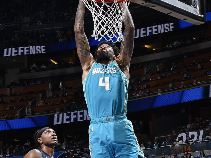 ORLANDO, FL - MARCH 19: Nick Richards #4 of the Charlotte Hornets dunks the ball during the game against the Orlando Magic on March 19, 2024 at the Kia Center in Orlando, Florida. NOTE TO USER: User expressly acknowledges and agrees that, by downloading and or using this photograph, User is consenting to the terms and conditions of the Getty Images License Agreement. Mandatory Copyright Notice: Copyright 2024 NBAE (Photo by Gary Bassing/NBAE via Getty Images)