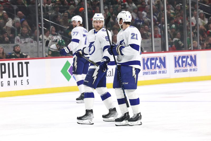 Jan 4, 2023; Saint Paul, Minnesota, USA;  Tampa Bay Lightning center Steven Stamkos (91) talks with Tampa Bay Lightning center Brayden Point (21) during the first period  Xcel Energy Center. Mandatory Credit: Bruce Fedyck-USA TODAY Sports