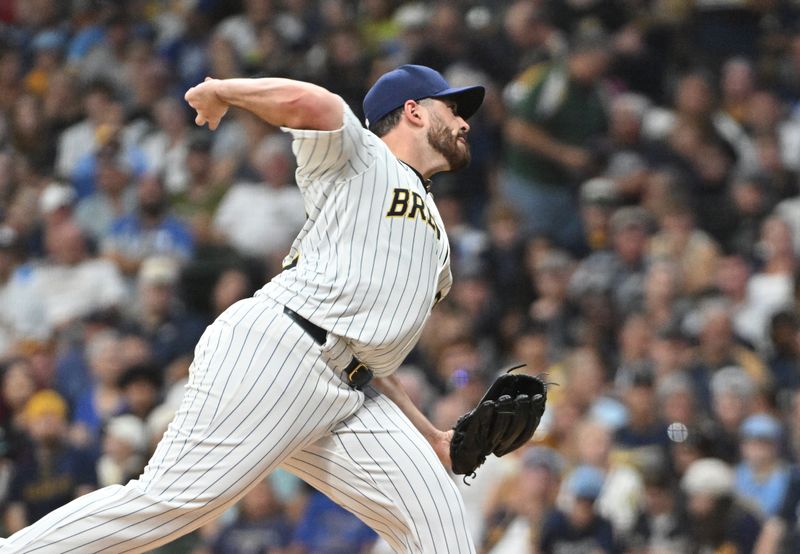 Sep 21, 2024; Milwaukee, Wisconsin, USA; Milwaukee Brewers pitcher Aaron Civale (32) delivers a pitch against the Arizona Diamondbacks in the first inning at American Family Field. Mandatory Credit: Michael McLoone-Imagn Images