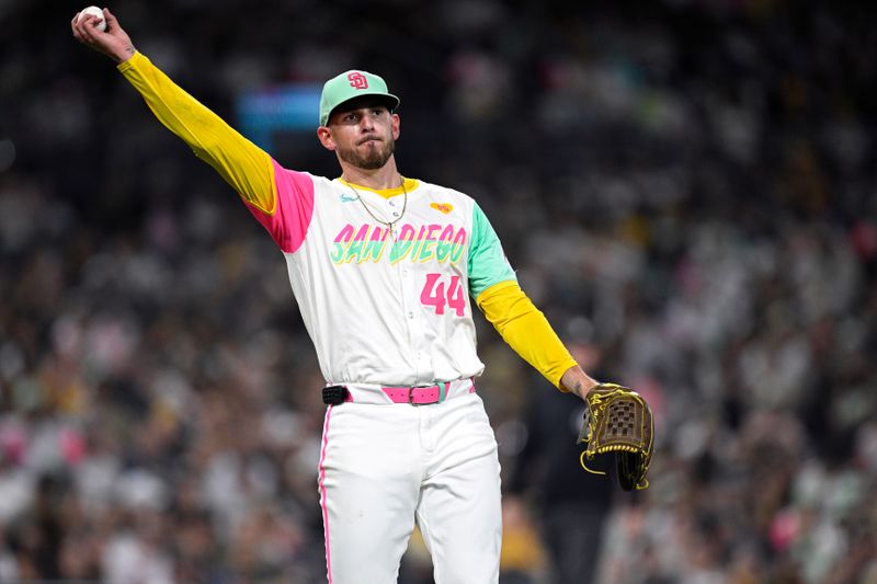 Sep 20, 2024; San Diego, California, USA; San Diego Padres starting pitcher Joe Musgrove (44) throws to first base during the fifth inning against the Chicago White Sox at Petco Park. Mandatory Credit: Orlando Ramirez-Imagn Images