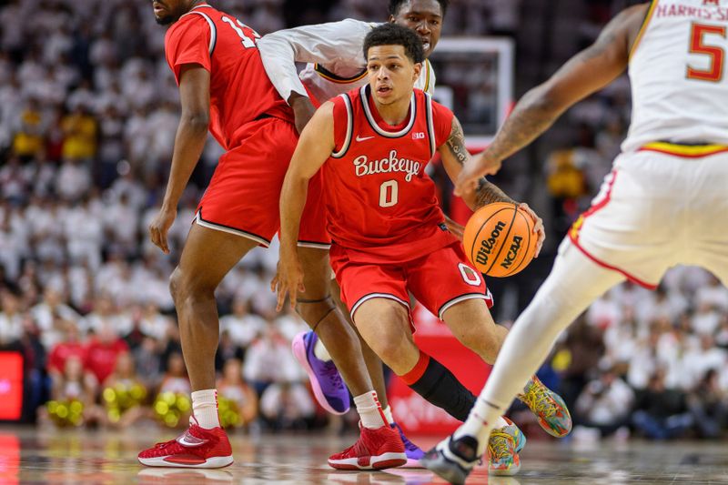 Dec 4, 2024; College Park, Maryland, USA; Ohio State Buckeyes guard John Mobley Jr. (0) drives to the basket against Maryland Terrapins during the first half at Xfinity Center. Mandatory Credit: Reggie Hildred-Imagn Images