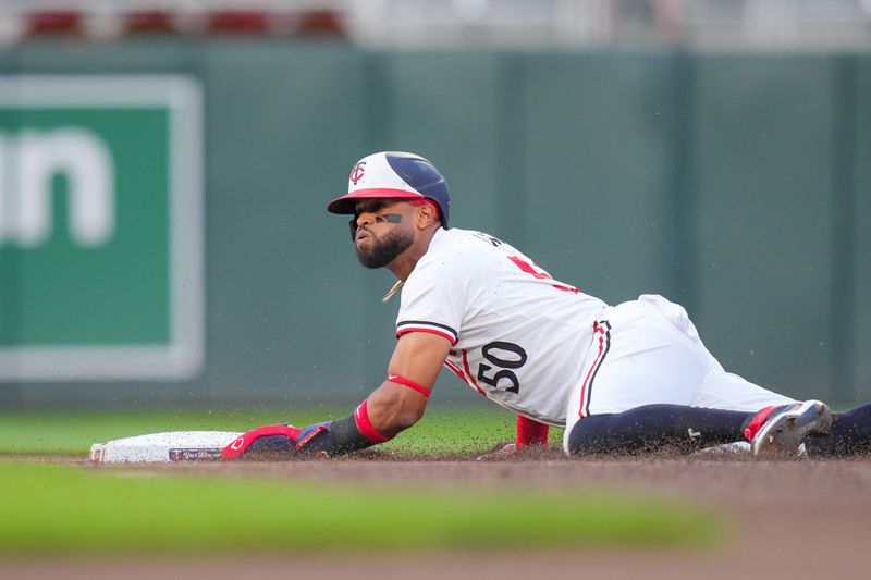 May 7, 2024; Minneapolis, Minnesota, USA; Minnesota Twins outfielder Willi Castro (50) steals second against the Seattle Mariners in the fourth inning at Target Field. Mandatory Credit: Brad Rempel-USA TODAY Sports