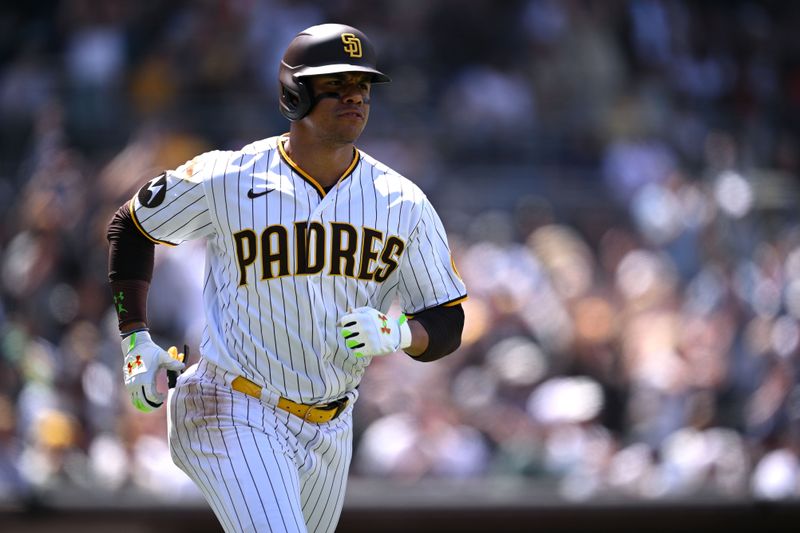 Apr 19, 2023; San Diego, California, USA; San Diego Padres left fielder Juan Soto (22) rounds the bases after hitting a home run against the Atlanta Braves during the fourth inning at Petco Park. Mandatory Credit: Orlando Ramirez-USA TODAY Sports