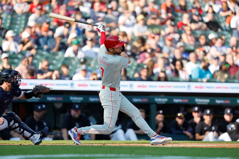 Jun 24, 2024; Detroit, Michigan, USA;  Philadelphia Phillies shortstop Trea Turner (7) hits a double in the first inning against the Detroit Tigers at Comerica Park. Mandatory Credit: Rick Osentoski-USA TODAY Sports