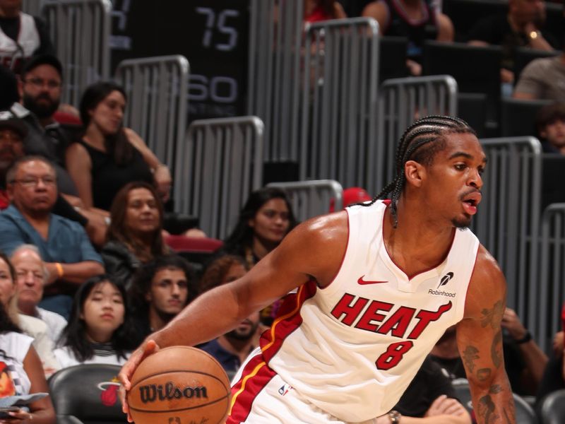 MIAMI, FL - OCTOBER 13: Josh Christopher #8 of the Miami Heat dribbles the ball during the game against the New Orleans Pelicans  during a NBA pre season game on October 13, 2024 at Kaseya Center in Miami, Florida. NOTE TO USER: User expressly acknowledges and agrees that, by downloading and or using this Photograph, user is consenting to the terms and conditions of the Getty Images License Agreement. Mandatory Copyright Notice: Copyright 2024 NBAE (Photo by Issac Baldizon/NBAE via Getty Images)