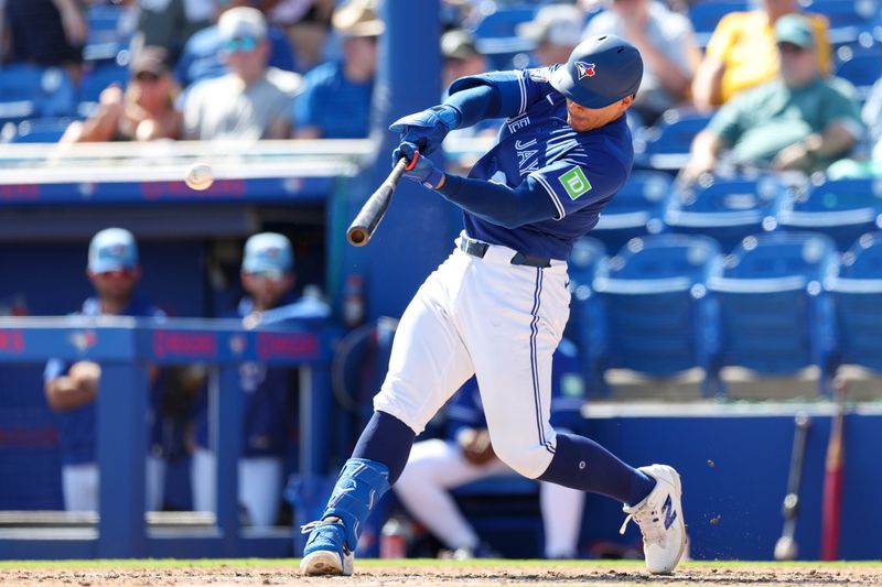 Mar 6, 2026; Dunedin, Florida, USA; Toronto Blue Jays catcher Brandon Valenzuela (59) singles against the Pittsburgh Pirates in the fourth inning during spring training at TD Ballpark. Mandatory Credit: Nathan Ray Seebeck-Imagn Images