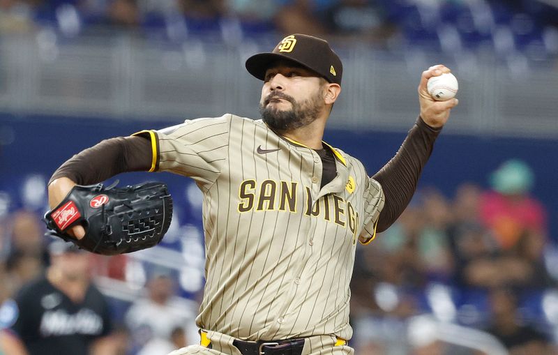 Aug 9, 2024; Miami, Florida, USA;  San Diego Padres starting pitcher Martin Perez (54) delivers a pitch against the Miami Marlins in the first inning at loanDepot Park. Mandatory Credit: Rhona Wise-USA TODAY Sports