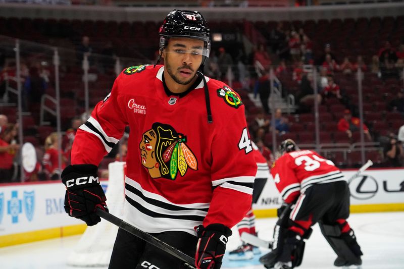 Oct 4, 2024; Chicago, Illinois, USA; Chicago Blackhawks defenseman Isaak Phillips (41) during warmups before a game against the Minnesota Wild at United Center. Mandatory Credit: David Banks-Imagn Images