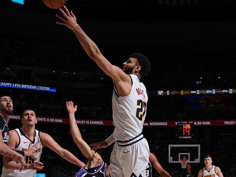 DENVER, CO - FEBRUARY 28: Jamal Murray #27 of the Denver Nuggets drives to the basket during the game against the Sacramento Kings on February 28, 2024 at the Ball Arena in Denver, Colorado. NOTE TO USER: User expressly acknowledges and agrees that, by downloading and/or using this Photograph, user is consenting to the terms and conditions of the Getty Images License Agreement. Mandatory Copyright Notice: Copyright 2024 NBAE (Photo by Garrett Ellwood/NBAE via Getty Images)