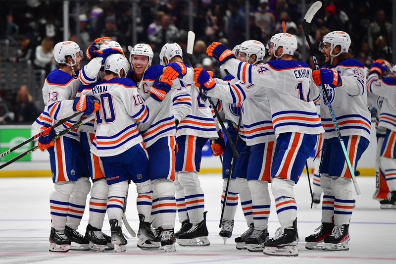 Dec 30, 2023; Los Angeles, California, USA; Edmonton Oilers celebrate the victory against the Los Angeles Kings following the shootout period at Crypto.com Arena. Mandatory Credit: Gary A. Vasquez-USA TODAY Sports