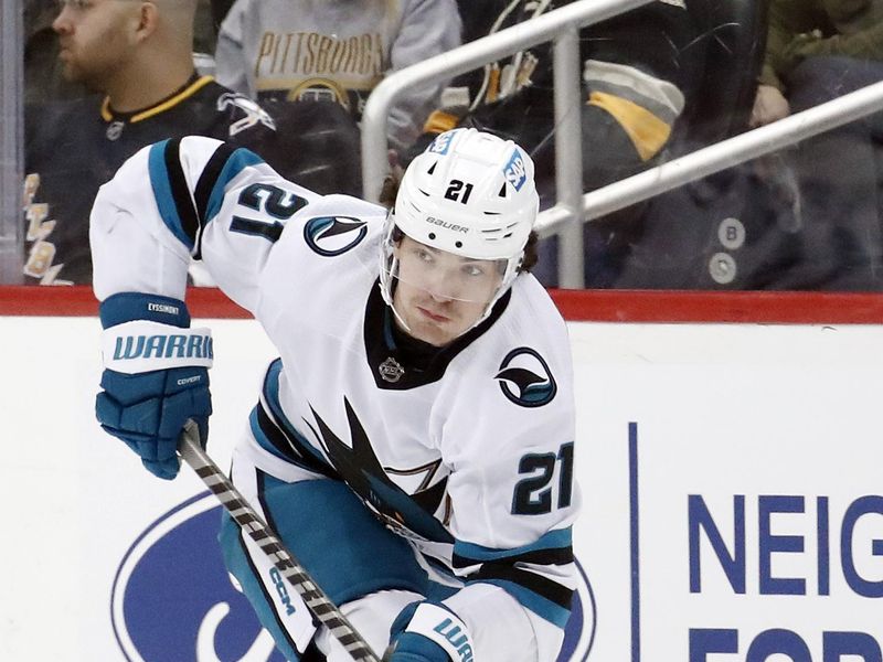 Jan 28, 2023; Pittsburgh, Pennsylvania, USA;  San Jose Sharks center Michael Eyssimont (21) skates up ice with the puck against the Pittsburgh Penguins during the second period at PPG Paints Arena. The Sharks won 6-4. Mandatory Credit: Charles LeClaire-USA TODAY Sports