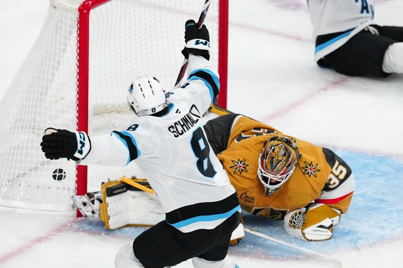 Nov 30, 2024; Las Vegas, Nevada, USA; Utah Hockey Club center Nick Schmaltz (8) celebrates after scoring a goal against the Vegas Golden Knights during the first period at T-Mobile Arena. Mandatory Credit: Stephen R. Sylvanie-Imagn Images