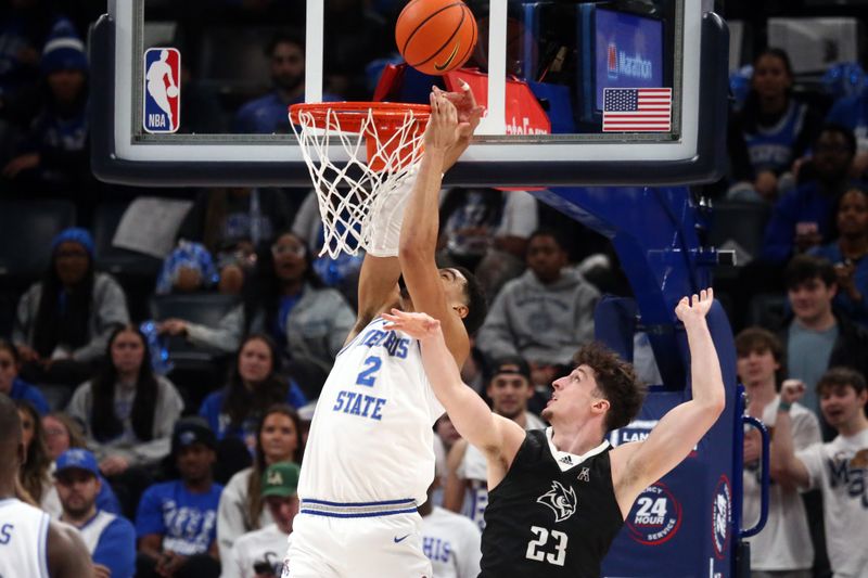 Jan 31, 2024; Memphis, Tennessee, USA; Memphis Tigers forward Nicholas Jourdain (2) tips in an alley-opp over Rice Owls guard Alem Huseinovic (23) during the second half at FedExForum. Mandatory Credit: Petre Thomas-USA TODAY Sports