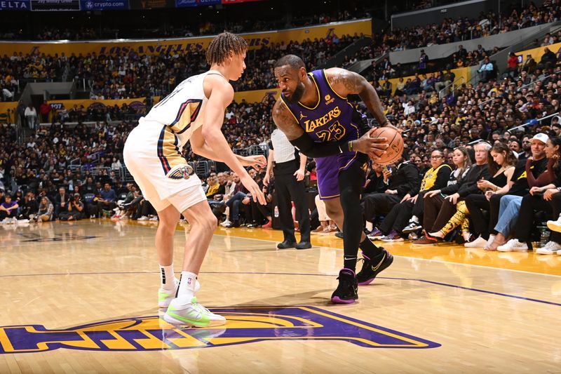 LOS ANGELES, CA - FEBRUARY 9: LeBron James #23 of the Los Angeles Lakers looks to pass the ball during the game against the New Orleans Pelicans on February 9, 2024 at Crypto.Com Arena in Los Angeles, California. NOTE TO USER: User expressly acknowledges and agrees that, by downloading and/or using this Photograph, user is consenting to the terms and conditions of the Getty Images License Agreement. Mandatory Copyright Notice: Copyright 2024 NBAE (Photo by Andrew D. Bernstein/NBAE via Getty Images)