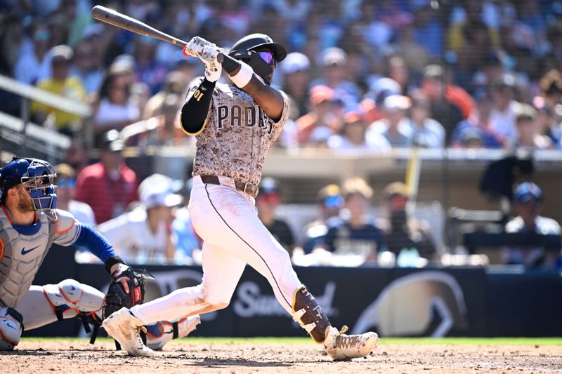 Aug 25, 2024; San Diego, California, USA; San Diego Padres left fielder Jurickson Profar (10) hits a two-run home run against the New York Mets during the eighth inning at Petco Park. Mandatory Credit: Orlando Ramirez-USA TODAY Sports