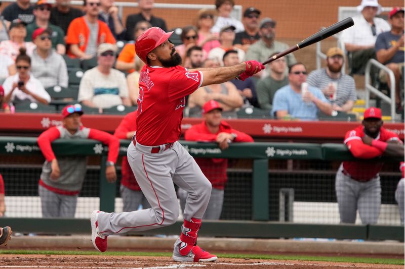 Feb 26, 2024; Scottsdale, Arizona, USA; Los Angeles Angels third baseman Anthony Rendon (6) hits against the San Francisco Giants in the first inning at Scottsdale Stadium. Mandatory Credit: Rick Scuteri-USA TODAY Sports