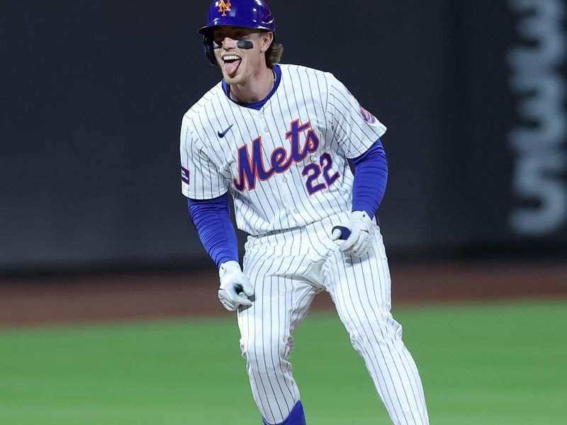 Apr 12, 2024; New York City, New York, USA; New York Mets third baseman Brett Baty (22) reacts after hitting a two run double against the Kansas City Royals during the fifth inning at Citi Field. Mandatory Credit: Brad Penner-USA TODAY Sports