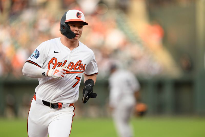 Apr 30, 2025; Baltimore, Maryland, USA; Baltimore Orioles second baseman Jackson Holliday (7) scores a run during the second inning against the New York Yankees at Oriole Park at Camden Yards. Mandatory Credit: Reggie Hildred-Imagn Images