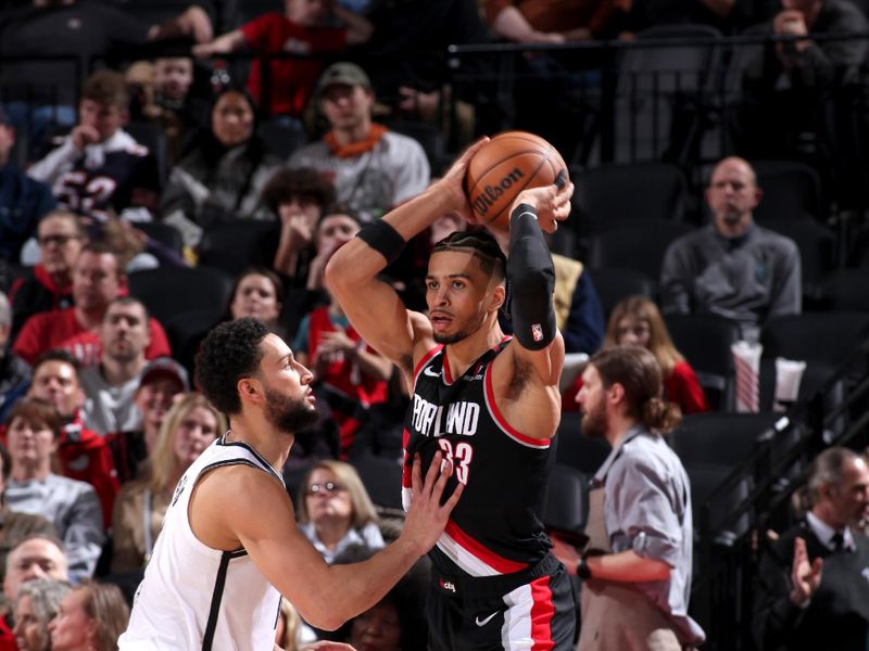 PORTLAND, OR - JANUARY 14: Toumani Camara #33 of the Portland Trail Blazers handles the ball during the game against the Brooklyn Nets on January 14, 2025 at the Moda Center Arena in Portland, Oregon. NOTE TO USER: User expressly acknowledges and agrees that, by downloading and or using this photograph, user is consenting to the terms and conditions of the Getty Images License Agreement. Mandatory Copyright Notice: Copyright 2025 NBAE (Photo by Cameron Browne/NBAE via Getty Images)