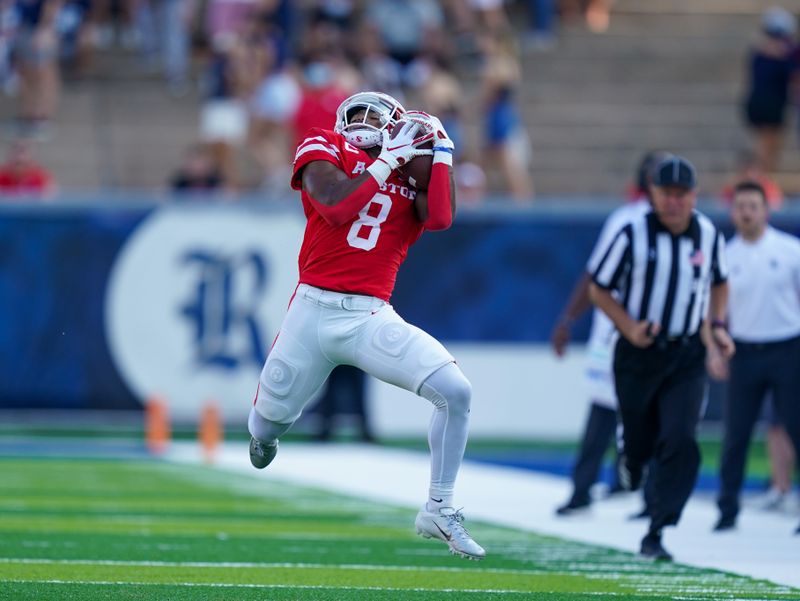 Sep 11, 2021; Houston, Texas, USA;  Houston Cougars running back Chandler Smith (8) catches a pass in the first half against the Rice Owls at Rice Stadium. Mandatory Credit: Daniel Dunn-USA TODAY Sports