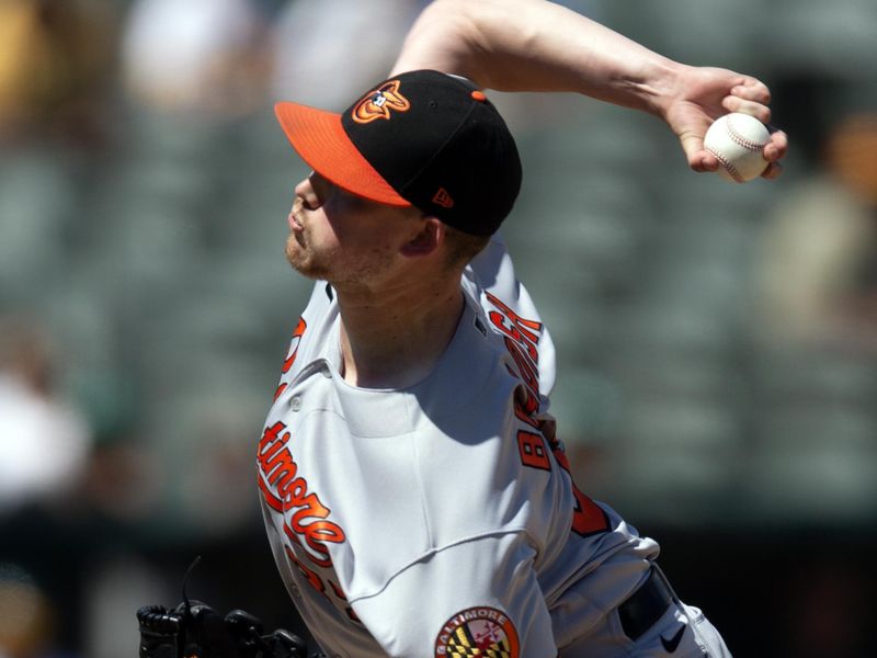 Aug 20, 2023; Oakland, California, USA; Baltimore Orioles starting pitcher Kyle Bradish (39) delivers a pitch against the Oakland Athletics during the fifth inning at Oakland-Alameda County Coliseum. Mandatory Credit: D. Ross Cameron-USA TODAY Sports