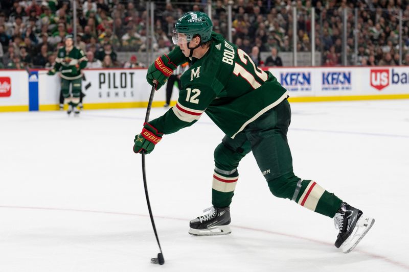 Mar 3, 2024; Saint Paul, Minnesota, USA; Minnesota Wild left wing Matt Boldy (12) shoots on the San Jose Sharks in the second period at Xcel Energy Center. Mandatory Credit: Matt Blewett-USA TODAY Sports