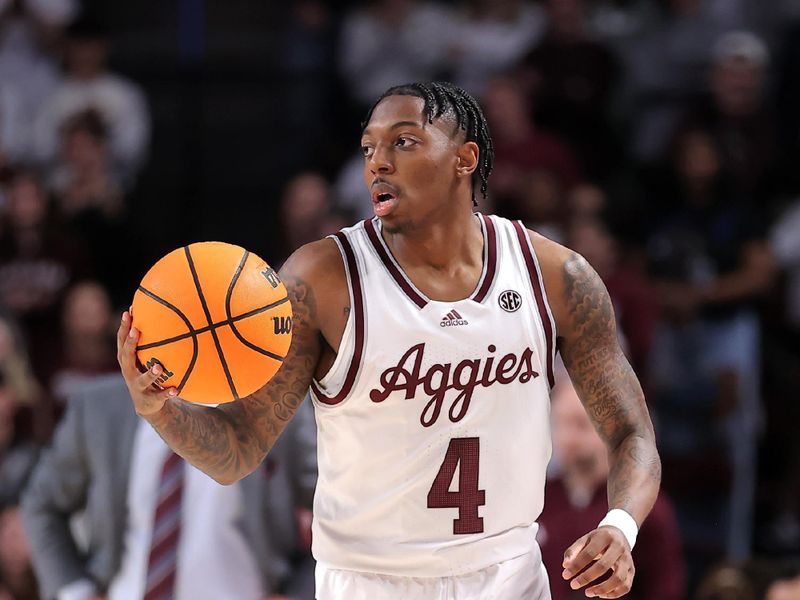 Dec 10, 2023; College Station, Texas, USA; Texas A&M Aggies guard Wade Taylor IV (4) handles the ball against the Memphis Tigers during the first half at Reed Arena. Mandatory Credit: Erik Williams-USA TODAY Sports