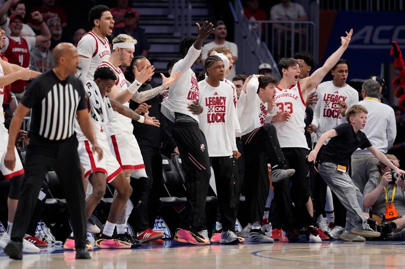 Mar 11, 2026; Charlotte, NC, USA; Louisville Cardinals bench reacts during the second half against the Southern Methodist University Mustangs at Spectrum Center. Mandatory Credit: Jim Dedmon-Imagn Images