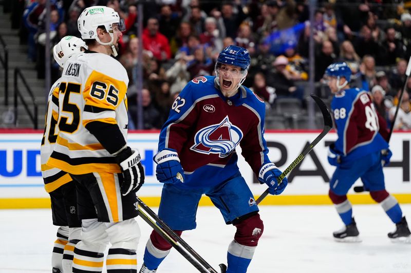 Mar 4, 2025; Denver, Colorado, USA; Colorado Avalanche left wing Artturi Lehkonen (62) celebrates his goal in front of Pittsburgh Penguins defenseman Erik Karlsson (65) during the second period at Ball Arena. Mandatory Credit: Ron Chenoy-Imagn Images