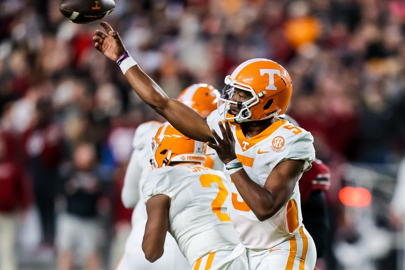 Nov 19, 2022; Columbia, South Carolina, USA; Tennessee Volunteers quarterback Hendon Hooker (5) passes against the South Carolina Gamecocks in the first quarter at Williams-Brice Stadium. Mandatory Credit: Jeff Blake-USA TODAY Sports