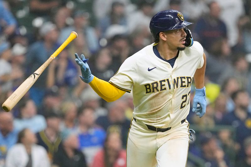 Jun 10, 2024; Milwaukee, Wisconsin, USA;  Milwaukee Brewers shortstop Willy Adames (27) tosses his bat away after hitting a home run  during the fourth inning against the Toronto Blue Jays at American Family Field. Mandatory Credit: Jeff Hanisch-USA TODAY Sports