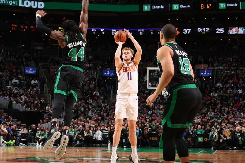 BOSTON, MA - FEBRUARY 3: Jock Landale #11 of the Phoenix Suns shoots the ball during the game against the Boston Celtics on February 3, 2023 at TD Garden in Boston, Massachusetts.  NOTE TO USER: User expressly acknowledges and agrees that, by downloading and or using this photograph, User is consenting to the terms and conditions of the Getty Images License Agreement. Mandatory Copyright Notice: Copyright 2022 NBAE  (Photo by Nathaniel S. Butler/NBAE via Getty Images)