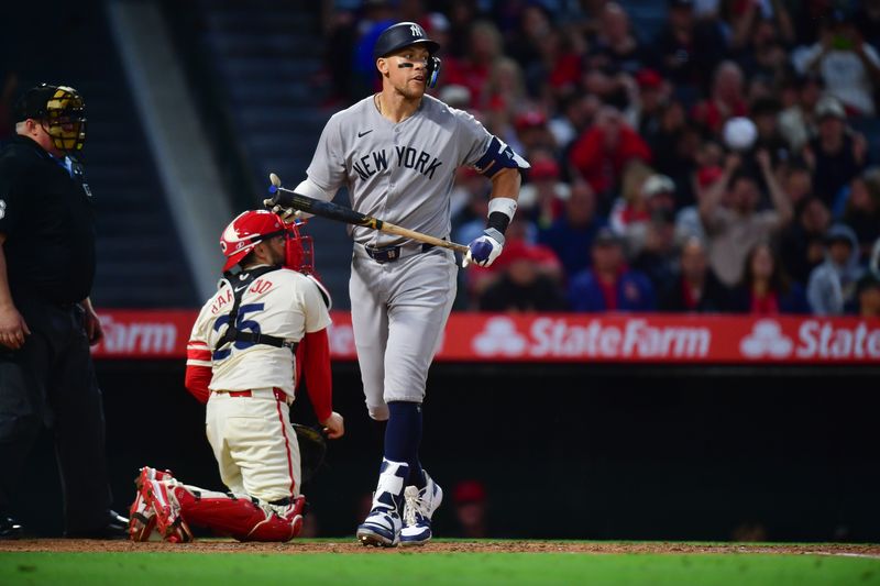 May 27, 2025; Anaheim, California, USA; New York Yankees right fielder Aaron Judge (99) reacts after striking out against the Los Angeles Angels during the sixth inning at Angel Stadium. Mandatory Credit: Gary A. Vasquez-Imagn Images