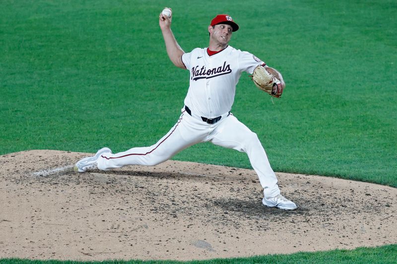 Jul 23, 2024; Washington, District of Columbia, USA; Washington Nationals relief pitcher Jacob Barnes (59) pitches against the San Diego Padres during the eighth inning at Nationals Park. Mandatory Credit: Geoff Burke-USA TODAY Sports