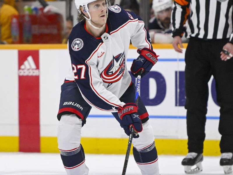 Jan 17, 2023; Nashville, Tennessee, USA;  Columbus Blue Jackets defenseman Adam Boqvist (27) skates against the Nashville Predators during the second period at Bridgestone Arena. Mandatory Credit: Steve Roberts-USA TODAY Sports