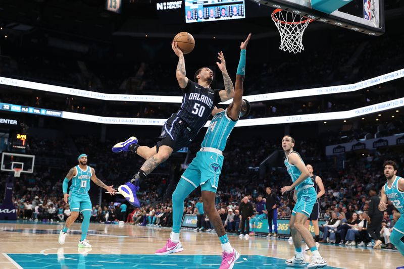 CHARLOTTE, NC - APRIL 5:  Cole Anthony #50 of the Orlando Magic drives to the basket during the game against the Charlotte Hornets on April 5, 2024 at Spectrum Center in Charlotte, North Carolina. NOTE TO USER: User expressly acknowledges and agrees that, by downloading and or using this photograph, User is consenting to the terms and conditions of the Getty Images License Agreement.  Mandatory Copyright Notice:  Copyright 2024 NBAE (Photo by Brock Williams-Smith/NBAE via Getty Images)