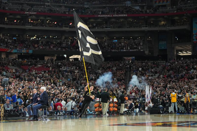 Apr 8, 2024; Glendale, AZ, USA; The Purdue Boilermakers enter the court before the national championship game of the Final Four of the 2024 NCAA Tournament between the Connecticut Huskies and the Purdue Boilermakers at State Farm Stadium. Mandatory Credit: Bob Donnan-USA TODAY Sports