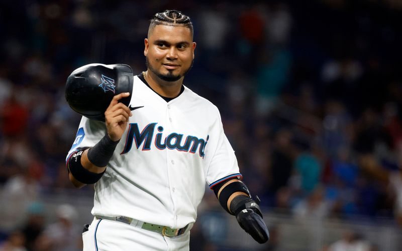 Sep 18, 2023; Miami, Florida, USA; Miami Marlins second baseman Luis Arraez (3) walks back to first base against the New York Mets during the sixth inning at loanDepot Park. Mandatory Credit: Rhona Wise-USA TODAY Sports