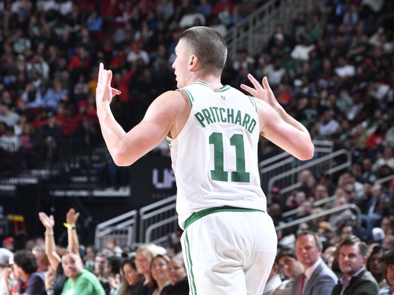 HOUSTON, TX - JANUARY 3:  Payton Pritchard #11 of the Boston Celtics celebrates during the game against the Houston Rockets on January 3, 2025 at the Toyota Center in Houston, Texas. NOTE TO USER: User expressly acknowledges and agrees that, by downloading and or using this photograph, User is consenting to the terms and conditions of the Getty Images License Agreement. Mandatory Copyright Notice: Copyright 2025 NBAE (Photo by Logan Riely/NBAE via Getty Images)