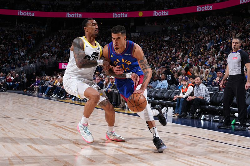 DENVER, CO - MARCH 9: Michael Porter Jr. #1 of the Denver Nuggets drives to the basket during the game against the Utah Jazz on March 9, 2024 at the Ball Arena in Denver, Colorado. NOTE TO USER: User expressly acknowledges and agrees that, by downloading and/or using this Photograph, user is consenting to the terms and conditions of the Getty Images License Agreement. Mandatory Copyright Notice: Copyright 2024 NBAE (Photo by Garrett Ellwood/NBAE via Getty Images)