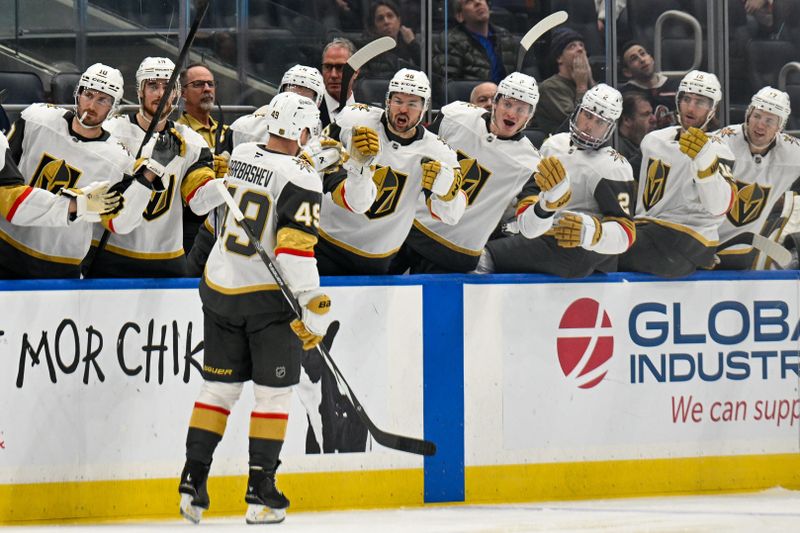 Dec 9, 2025; Elmont, New York, USA; Vegas Golden Knights left wing Ivan Barbashev (49) celebrates his goal against the New York Islanders during during the third period at UBS Arena. Mandatory Credit: Dennis Schneidler-Imagn Images