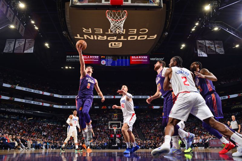 PHOENIX, AZ - JANUARY 3: Grayson Allen #8 of the Phoenix Suns shoots the ball during the game against the LA Clippers on January 3, 2024 at Footprint Center in Phoenix, Arizona. NOTE TO USER: User expressly acknowledges and agrees that, by downloading and or using this photograph, user is consenting to the terms and conditions of the Getty Images License Agreement. Mandatory Copyright Notice: Copyright 2024 NBAE (Photo by Barry Gossage/NBAE via Getty Images)