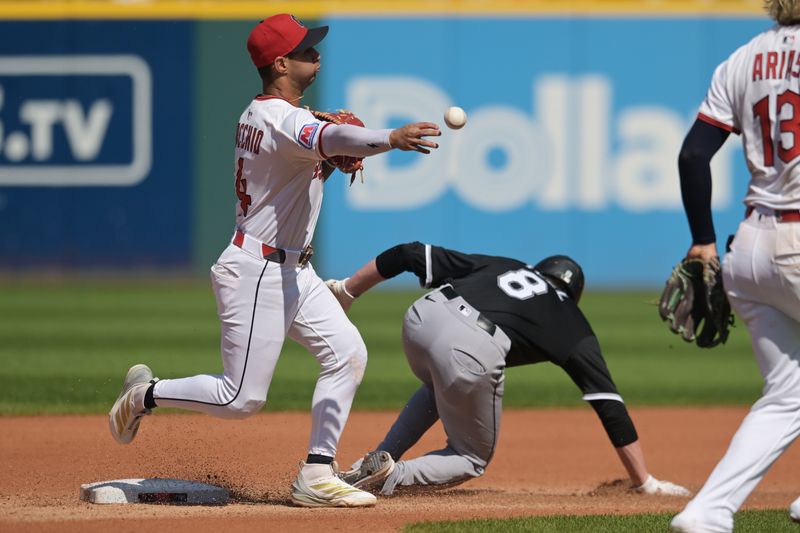 Sep 14, 2025; Cleveland, Ohio, USA; Cleveland Guardians second baseman Brayan Rocchio (4) forces out Chicago White Sox catcher Kyle Teel (8) but fails to make the double play during the fourth inning at Progressive Field. Mandatory Credit: Ken Blaze-Imagn Images
