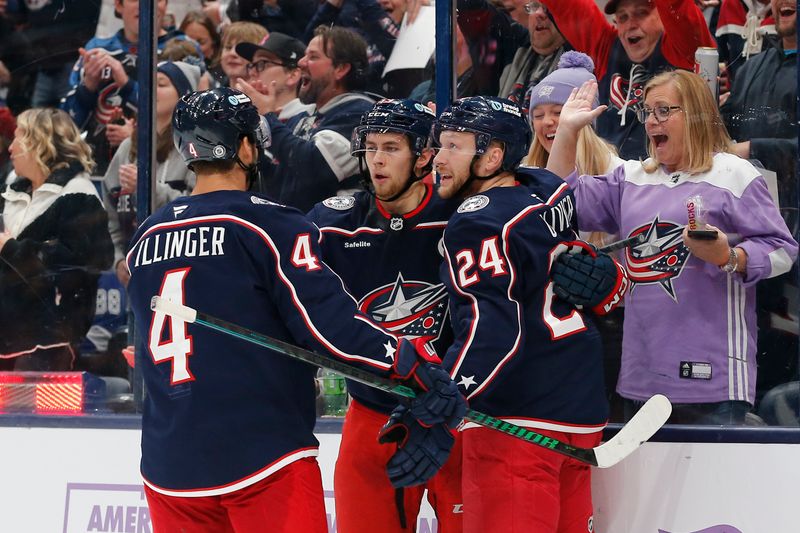 Nov 21, 2024; Columbus, Ohio, USA; Columbus Blue Jackets right wing Yegor Chinakhov (59) celebrates his goal against the Tampa Bay Lightning during the second period at Nationwide Arena. Mandatory Credit: Russell LaBounty-Imagn Images