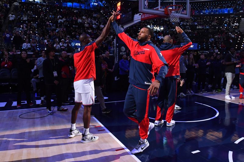 INGLEWOOD, CA - DECEMBER 1: Norman Powell #24 of the LA Clippers is introduced before the game against the Denver Nuggets on December 1, 2024 at Intuit Dome in Los Angeles, California. NOTE TO USER: User expressly acknowledges and agrees that, by downloading and/or using this Photograph, user is consenting to the terms and conditions of the Getty Images License Agreement. Mandatory Copyright Notice: Copyright 2024 NBAE (Photo by Juan Ocampo/NBAE via Getty Images)