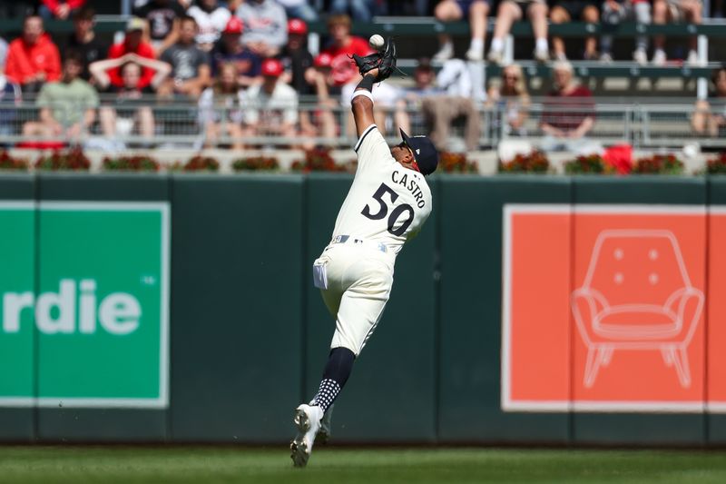 Apr 25, 2024; Minneapolis, Minnesota, USA; Minnesota Twins shortstop Willi Castro (50) catches a fly ball hit by Chicago White Sox catcher Korey Lee (26) during the sixth inning at Target Field. Mandatory Credit: Matt Krohn-USA TODAY Sports