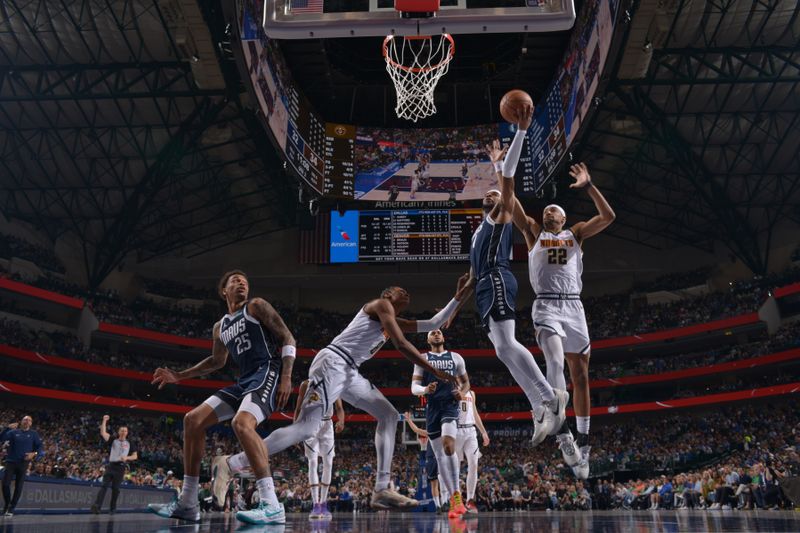 DALLAS, TX - MARCH 17: Jaden Hardy #1 of the Dallas Mavericks drives to the basket during the game against the Denver Nuggets on March 17, 2024 at the American Airlines Center in Dallas, Texas. NOTE TO USER: User expressly acknowledges and agrees that, by downloading and or using this photograph, User is consenting to the terms and conditions of the Getty Images License Agreement. Mandatory Copyright Notice: Copyright 2024 NBAE (Photo by Glenn James/NBAE via Getty Images)