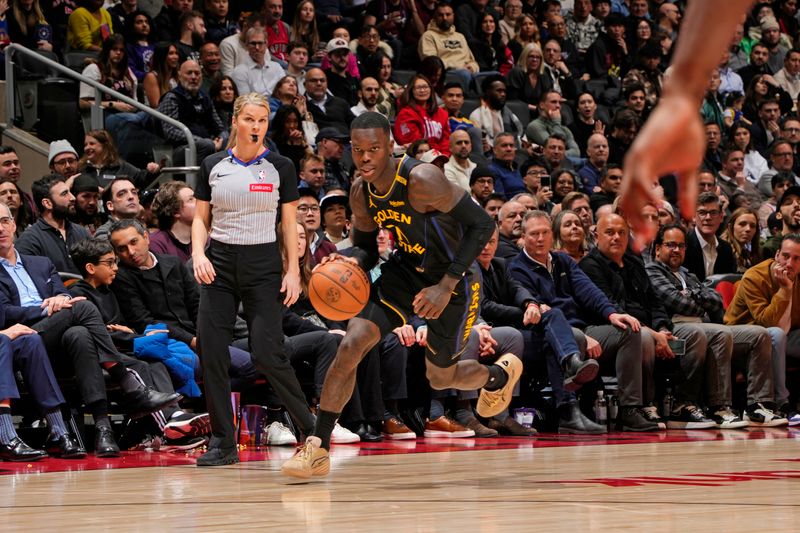 TORONTO, CANADA - JANUARY 13: Dennis Schroder #71 of the Golden State Warriors dribbles the ball during the game against the Toronto Raptors on January 13, 2025 at the Scotiabank Arena in Toronto, Ontario, Canada.  NOTE TO USER: User expressly acknowledges and agrees that, by downloading and or using this Photograph, user is consenting to the terms and conditions of the Getty Images License Agreement.  Mandatory Copyright Notice: Copyright 2025 NBAE (Photo by Mark Blinch/NBAE via Getty Images)