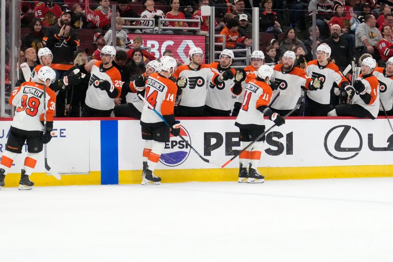 Mar 23, 2025; Chicago, Illinois, USA; Philadelphia Flyers right wing Travis Konecny (11) celebrates after his goal against the Chicago Blackhawks during the second period at United Center. Mandatory Credit: David Banks-Imagn Images